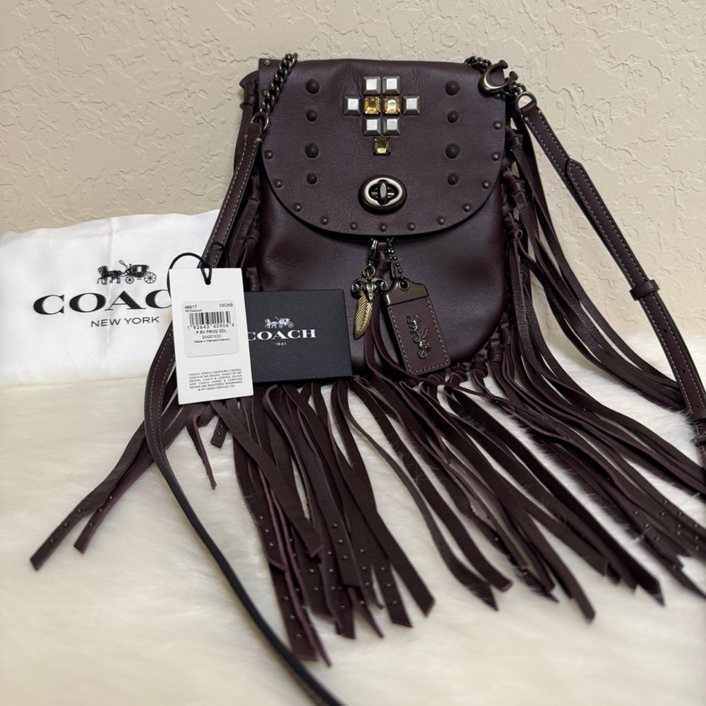 Coach Fringe Saddle Bag With Pyramid Rivets